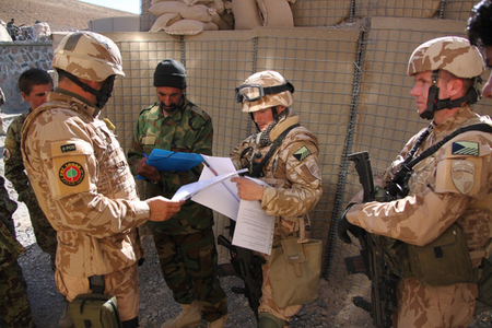 Commander of the Check Point Captain Abdul Qadir signs take-over protocols