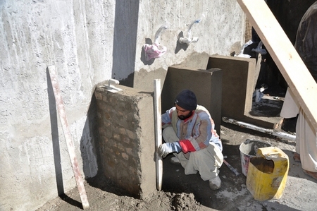Afghánští zedníci při práci.