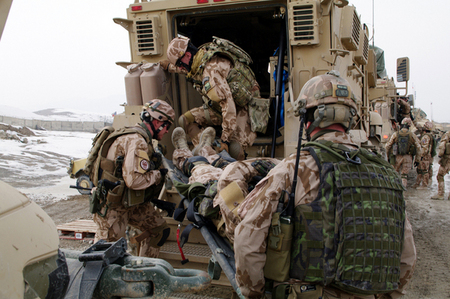Practice in loading of the wounded into MRAP vehicle