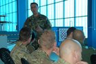 Major Michal Voltr při vyhodnocení oblasti výcviku FAC