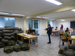 Odevzdání dokumentů a první materiál - spací pytel a další