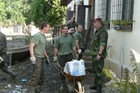 General Opata in discussion with soldiers