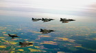 Pětice Gripenů ve formaci s L-159